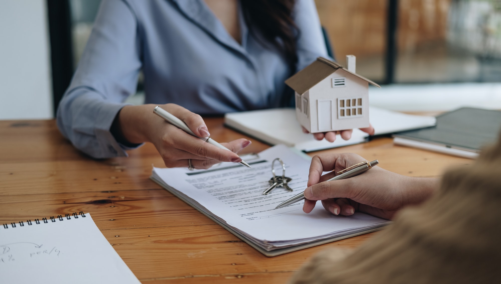 legal consultants, notary or justice lawyer discussing contract document on desk with client